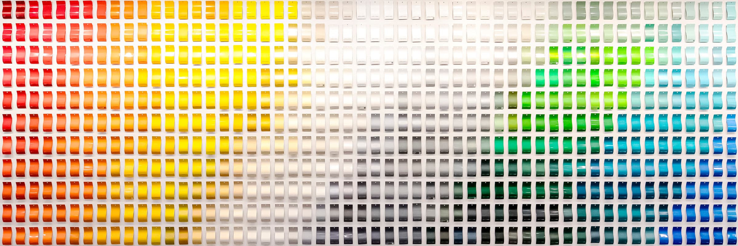 A vibrant collection of powder coating color swatches
